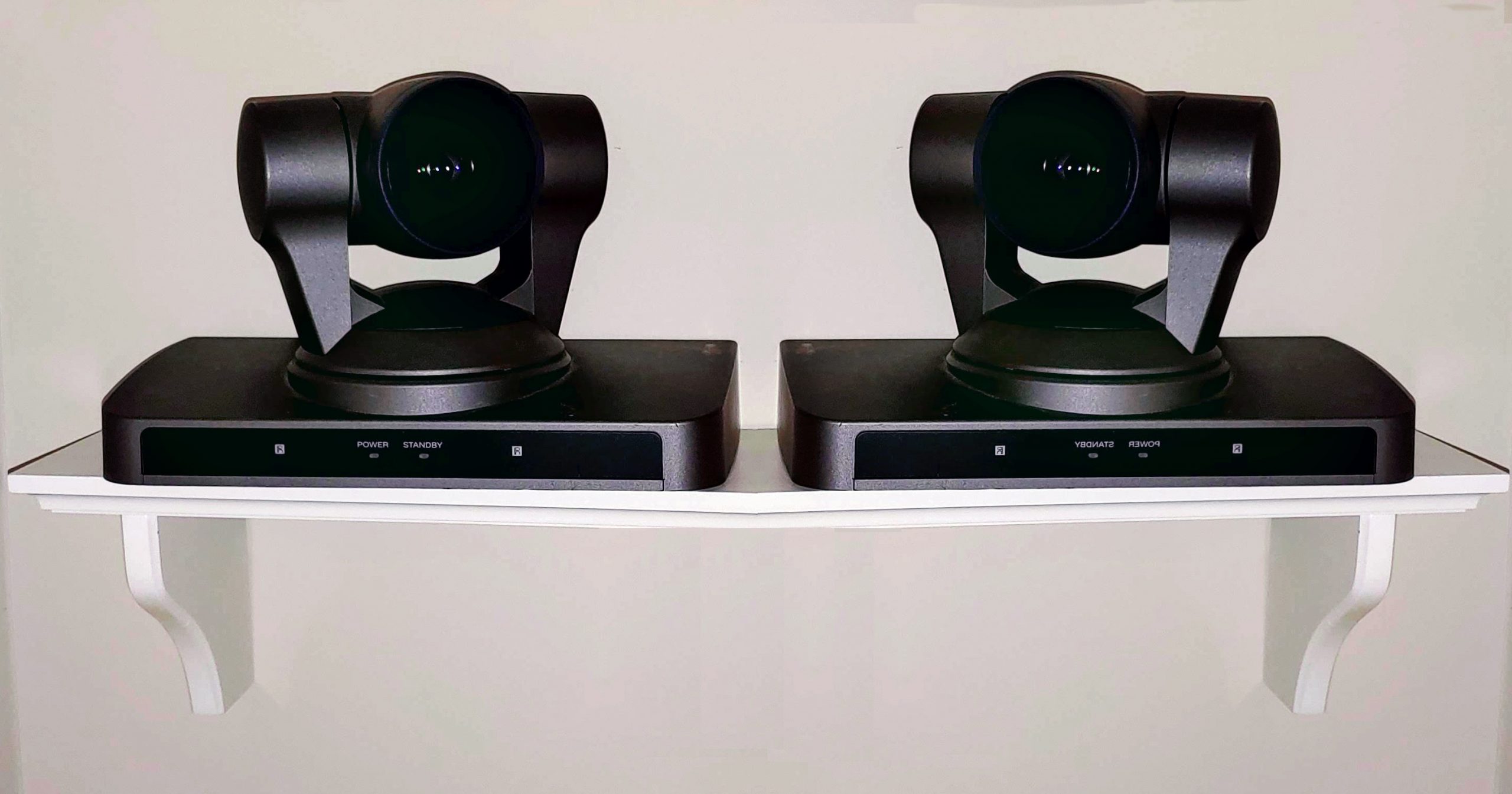 two-cameras_on_shelf1-retouched